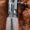 détail fusil gun métal